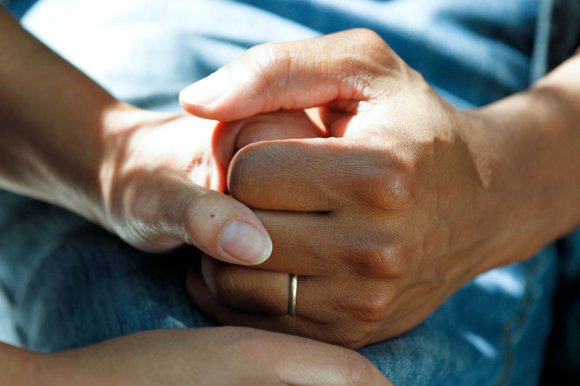 Supportive hand holding of cancer patient